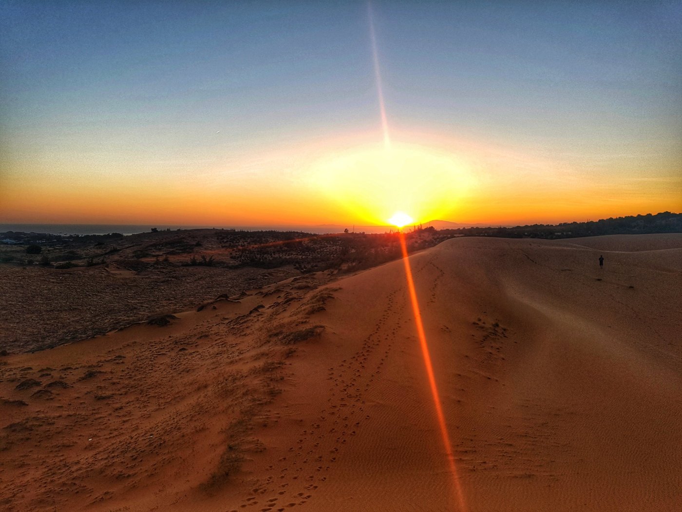 Sunset red sand dunes Mui Ne