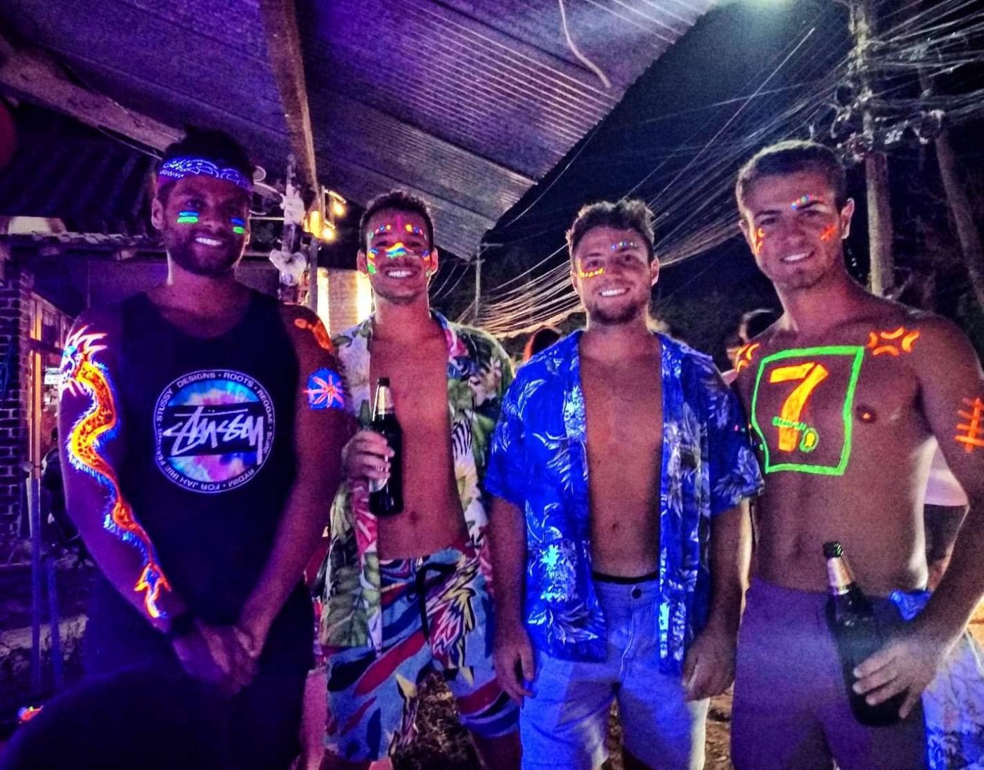 Conor, Ollie, Fred & Calum with glow in the dark paint ready for full moon party