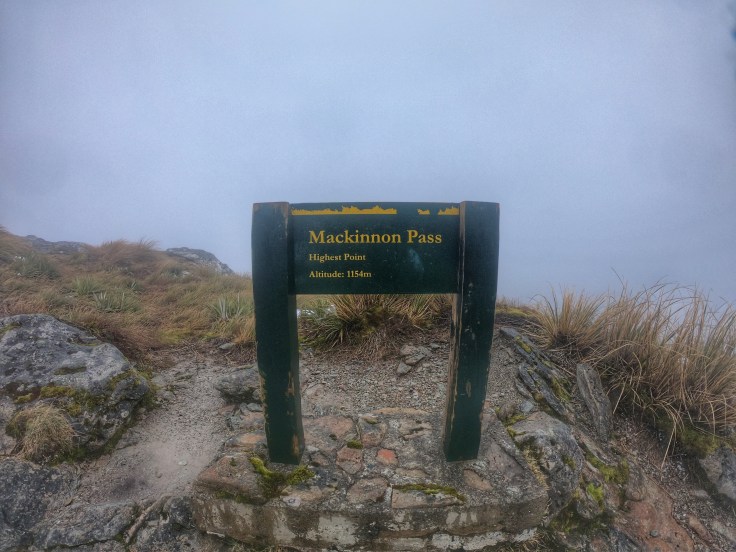 Sign on at the top of Mackinnon Pass, Milford Track NZ