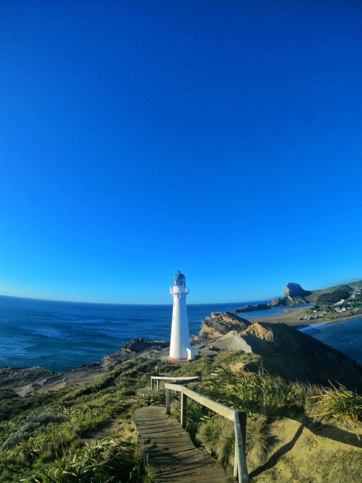 Castlepoint Lighthouse with Castle Rock in the background