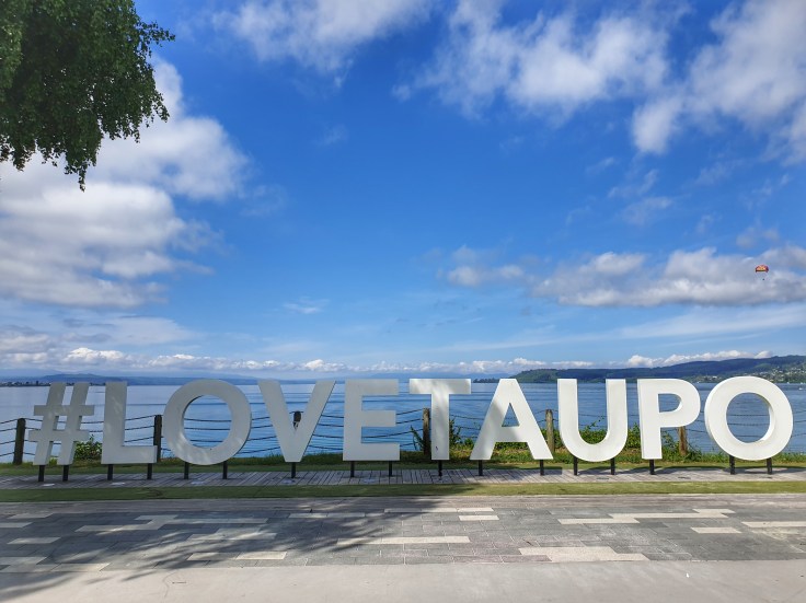 #lovetaupo sign at the lake front in Taupo, NZ