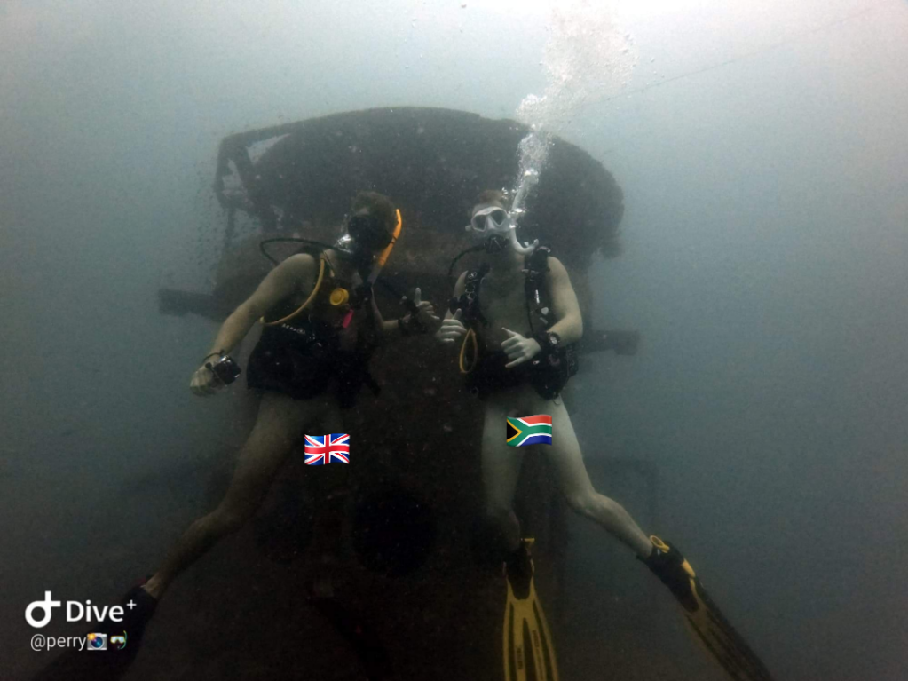Two naked divers at HTMS Sattakut Wreck