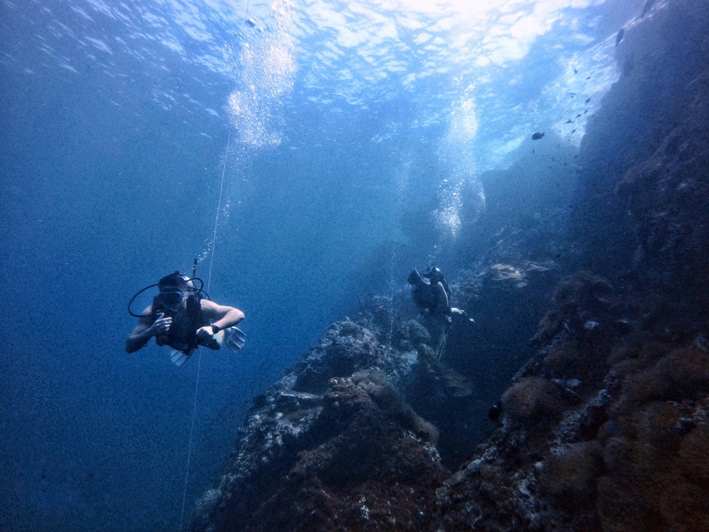 Two divers at Sail Rock, Gulf of Thailand
