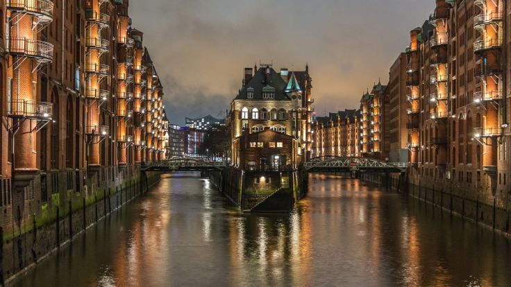 Waterways and Bridges of Hamburg in Germany at dusk