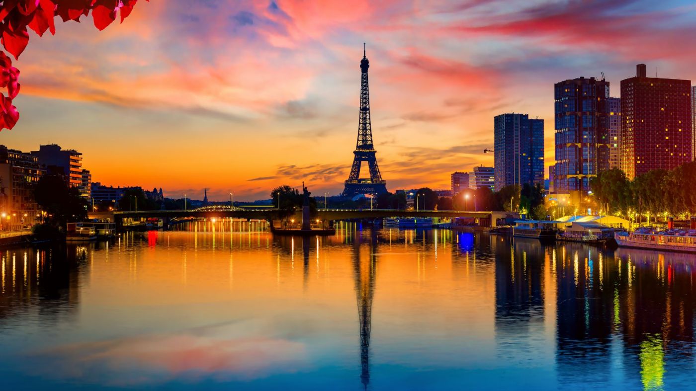 View along the River Seine towards the Eiffel tower at dusk