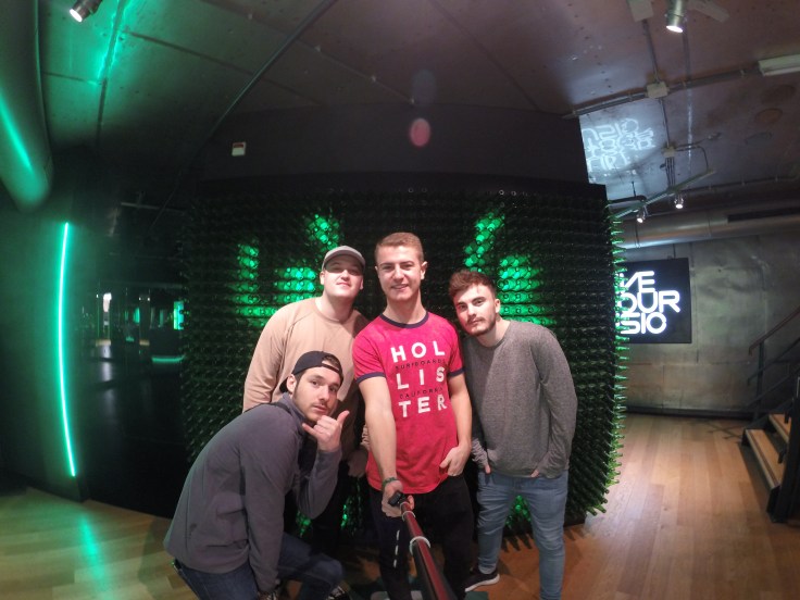 4 friends take a selfie in the Heineken Experience