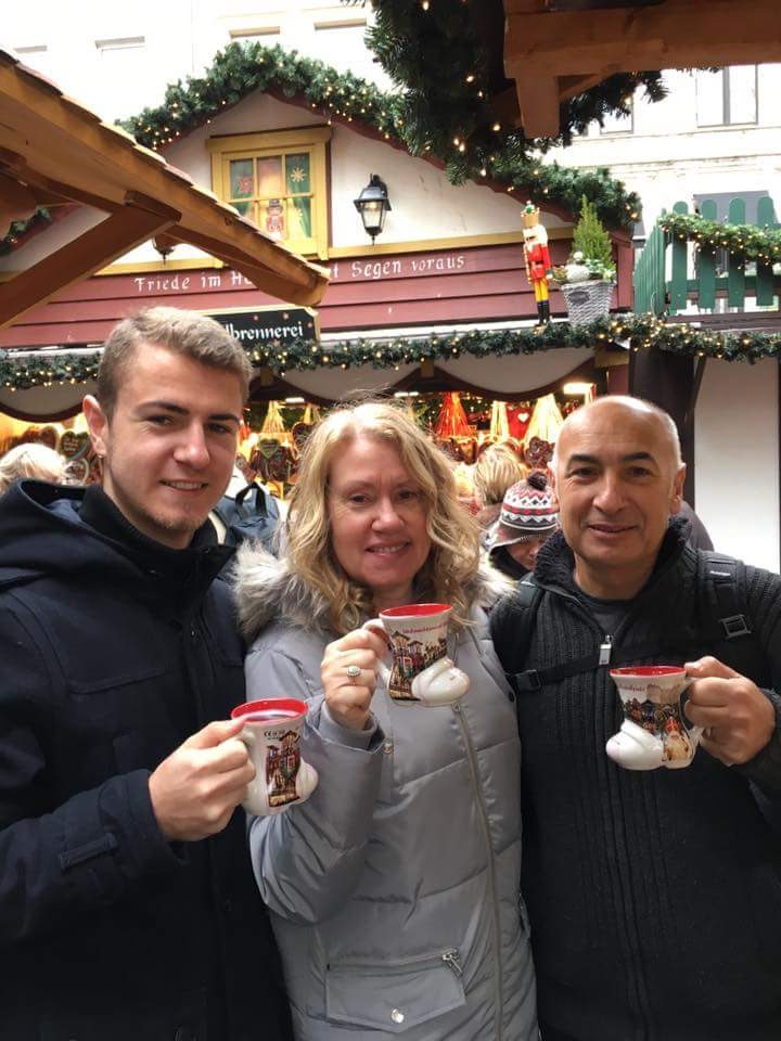 Family drinking Gluhwein at Cologne Christmas Market