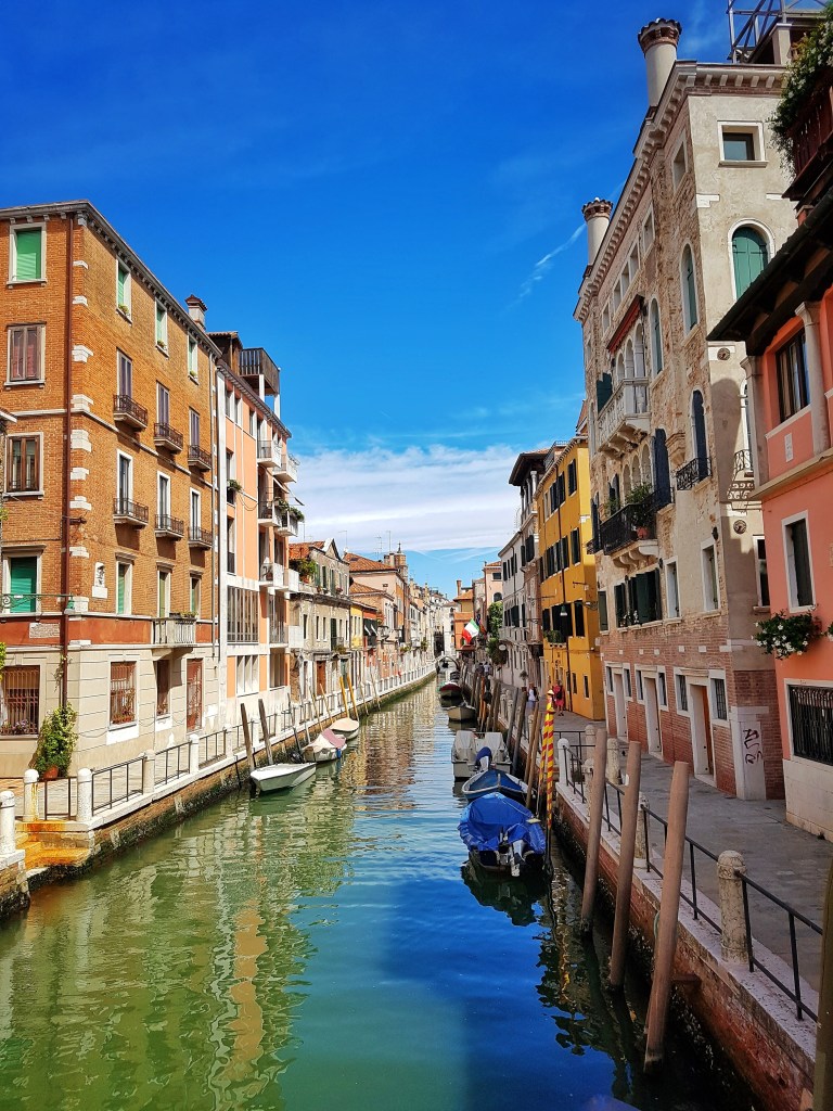 View of Venice canals from one of the bridges