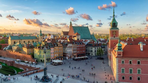 Areal view of Warsaw old town square at sunset